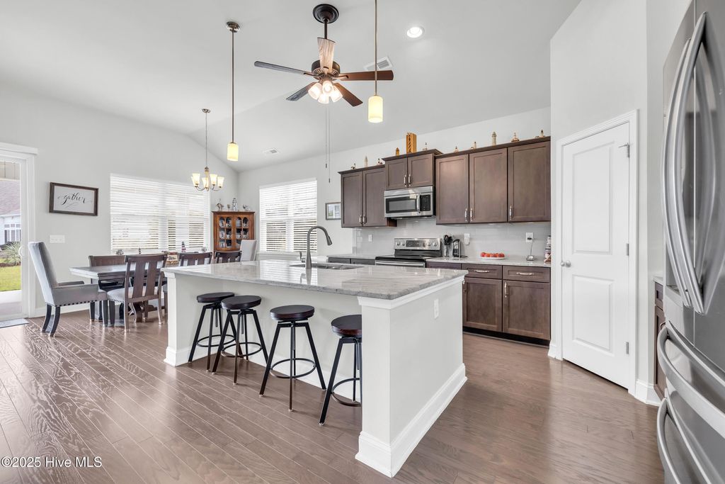 Photo of 3095 Crescent Lake Drive, Carolina Shores, NC 28467 (MLS # 100524676)