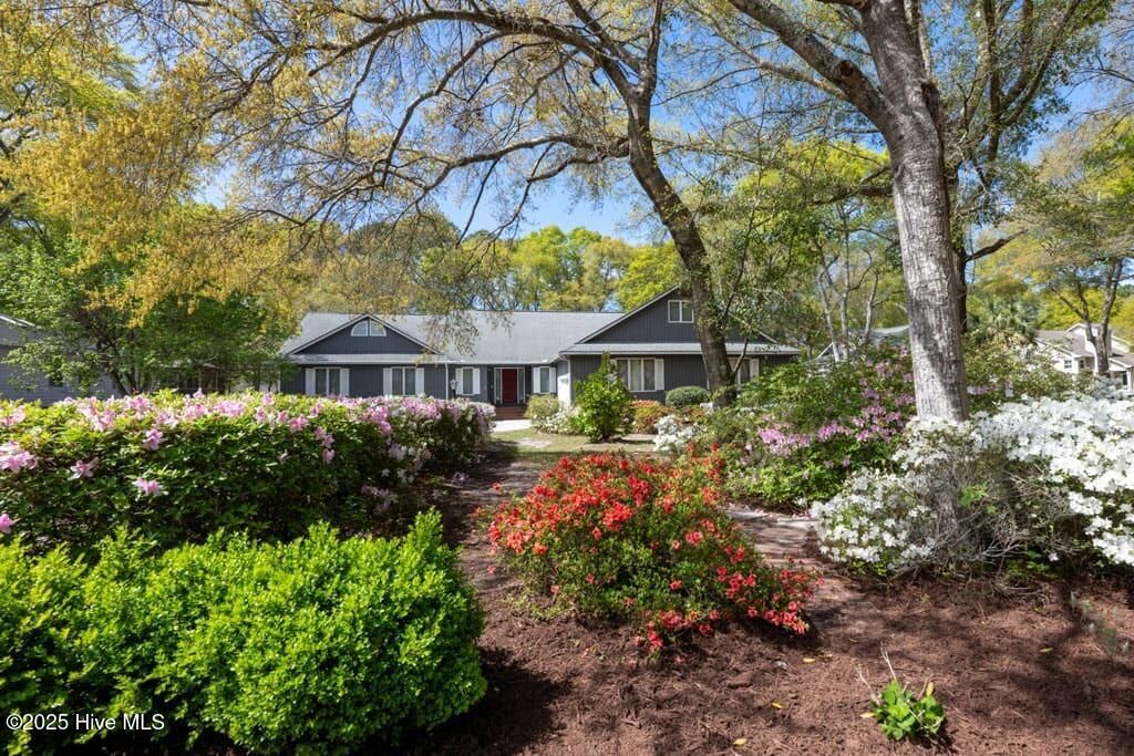 Photo of 401 Sea Trail Drive W, Sunset Beach, NC 28468 (MLS # 100524132)