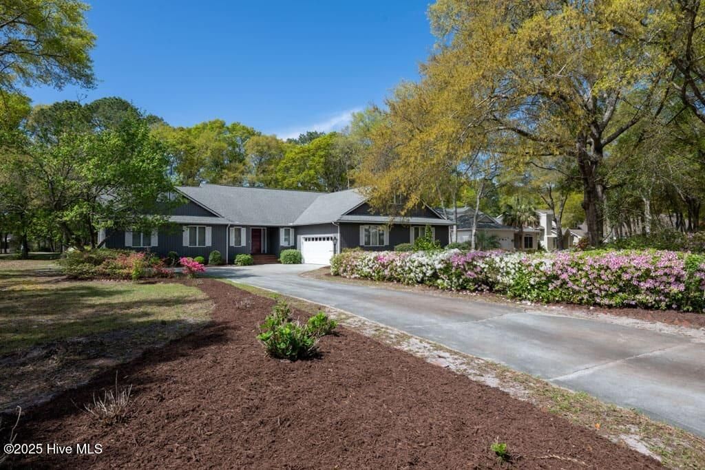 Photo of 401 Sea Trail Drive W, Sunset Beach, NC 28468 (MLS # 100524132)