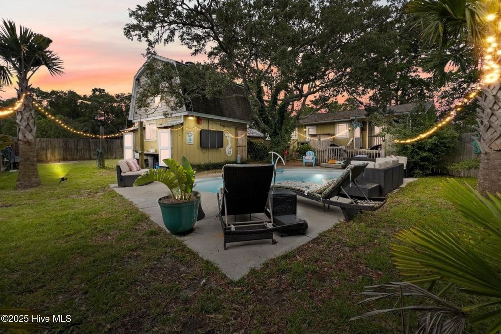 Photo of 302 Mcglamery Street, Oak Island, NC 28465 (MLS # 100512296)