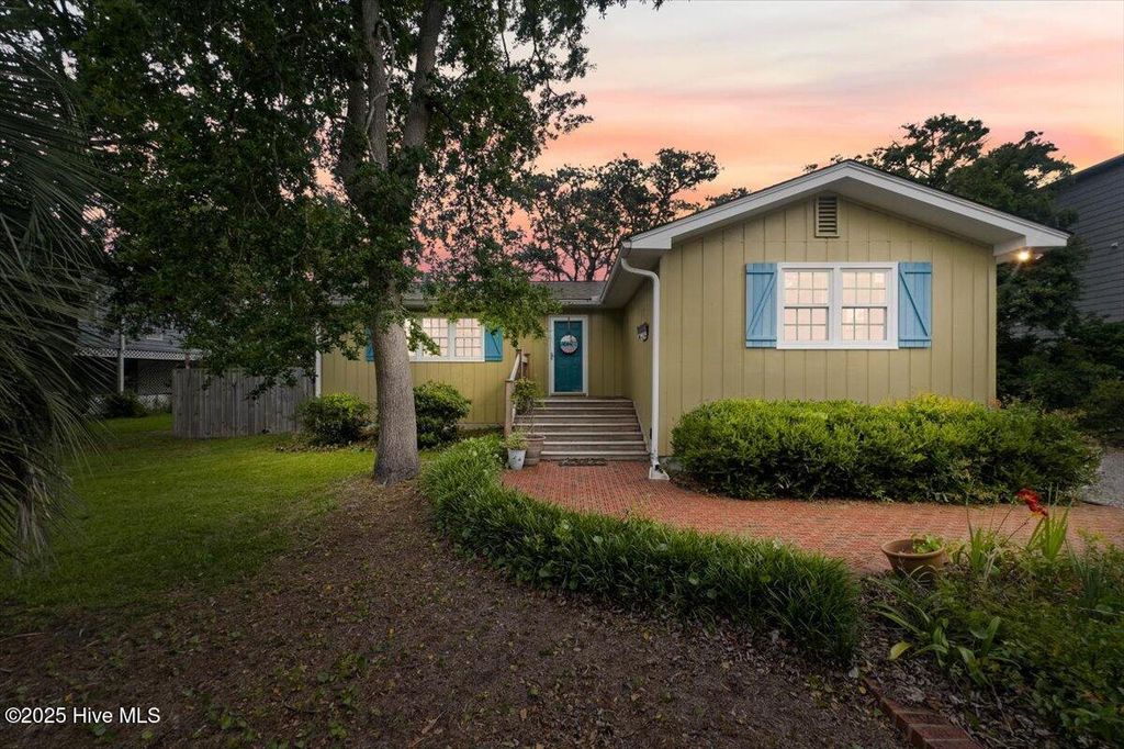 Photo of 302 Mcglamery Street, Oak Island, NC 28465 (MLS # 100512296)