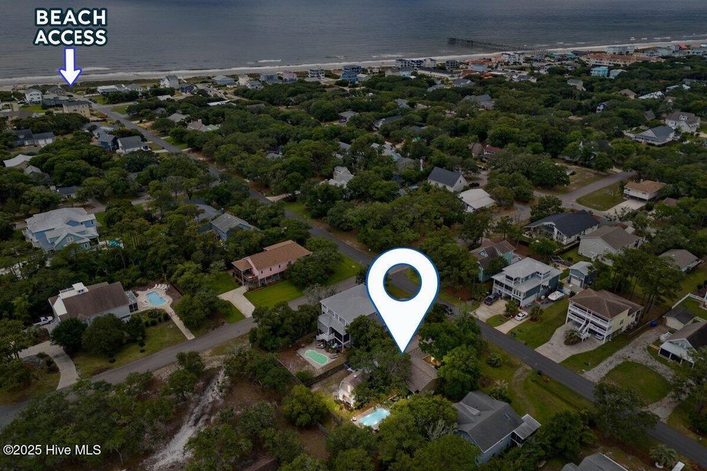 Photo of 302 Mcglamery Street, Oak Island, NC 28465 (MLS # 100512296)