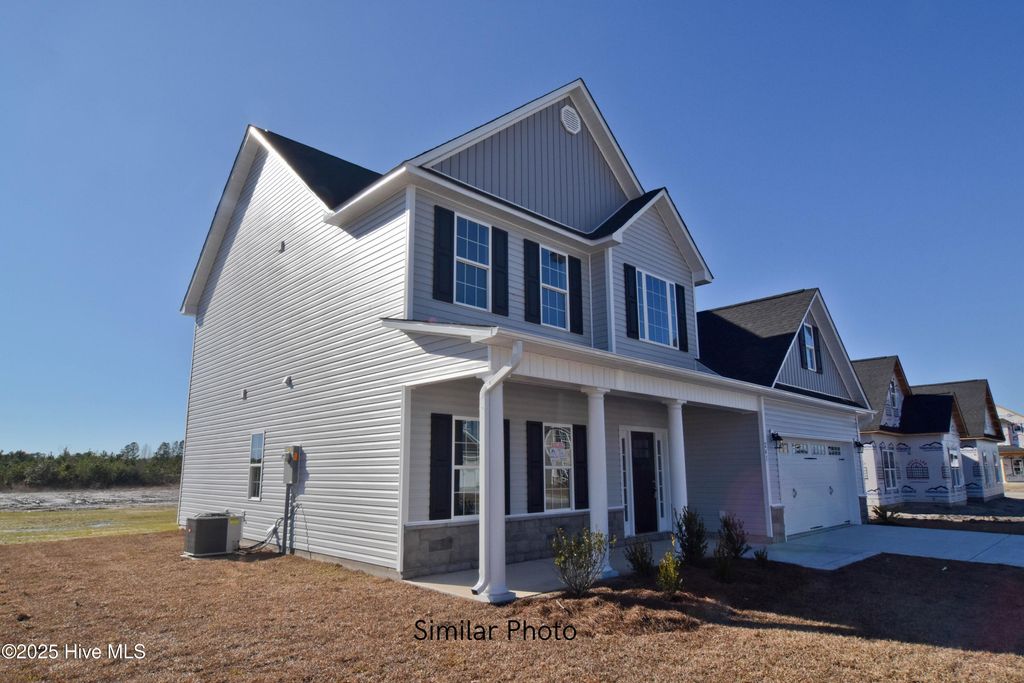 Photo of 718 Regiment Road, Jacksonville, NC 28546 (MLS # 100518960)
