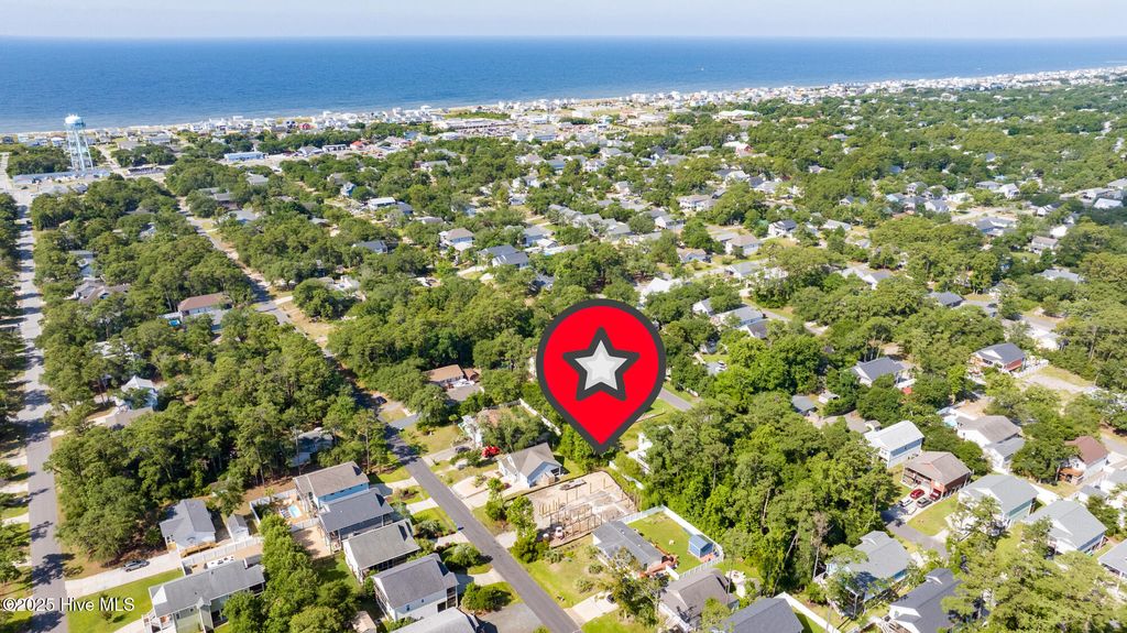 Photo of 315 NE 56th Street, Oak Island, NC 28465 (MLS # 100516902)