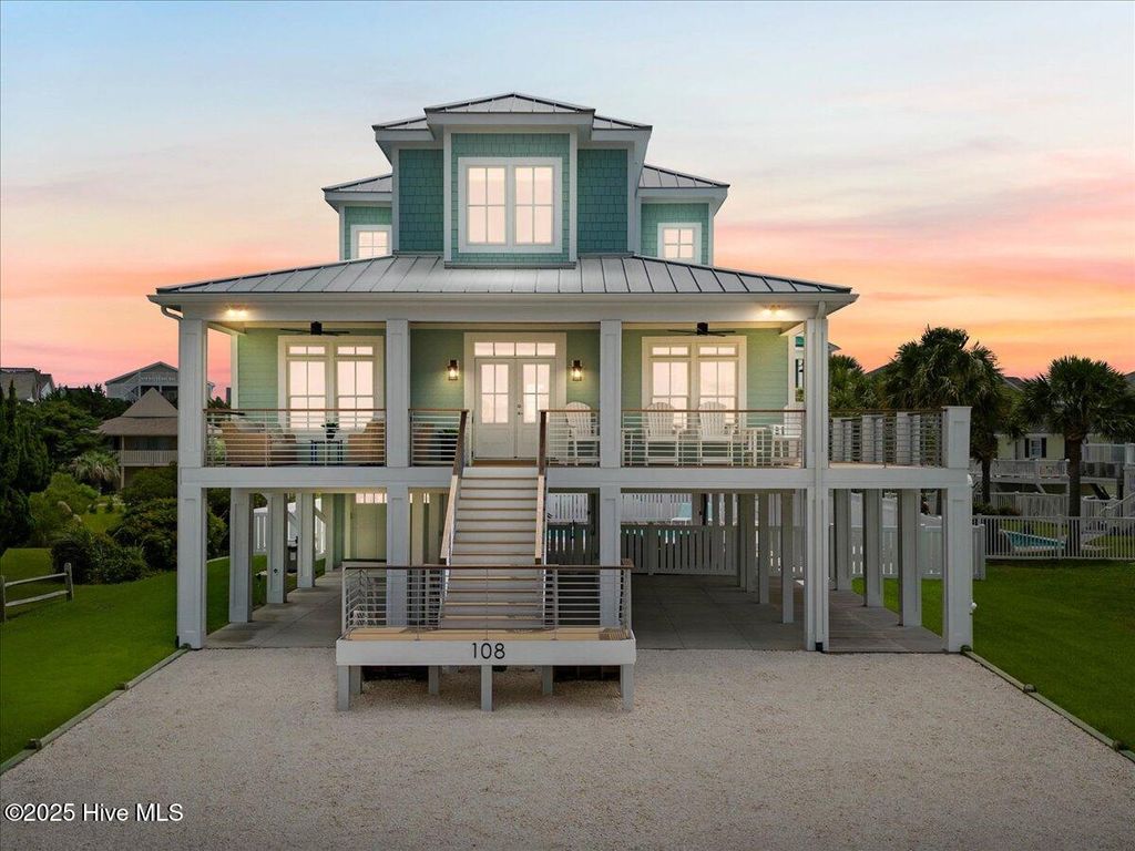 Photo of 108 Strawflower Drive, Holden Beach, NC 28462 (MLS # 100526533)