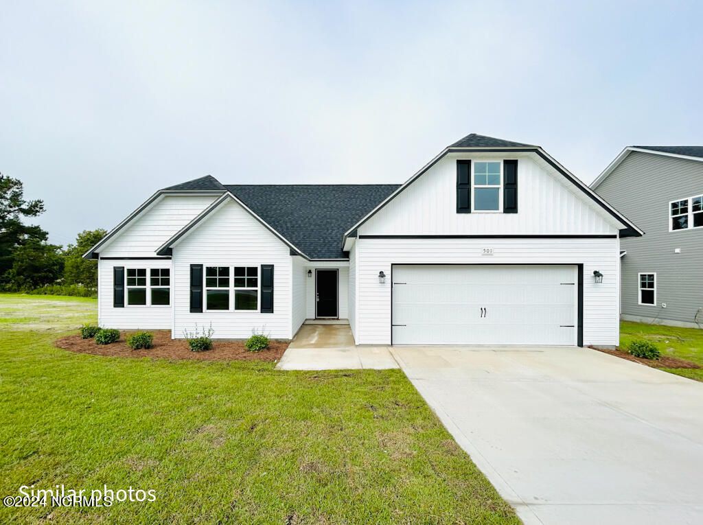 Photo of 136 Tides End Drive, Holly Ridge, NC 28445 (MLS # 100517766)
