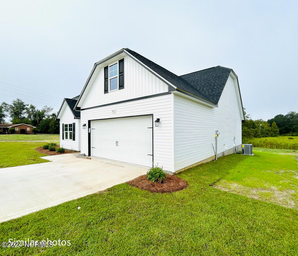 Photo of 136 Tides End Drive, Holly Ridge, NC 28445 (MLS # 100517766)
