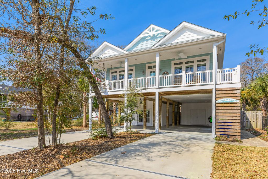 Photo of 117 NW 2nd Street, Oak Island, NC 28465 (MLS # 100499483)