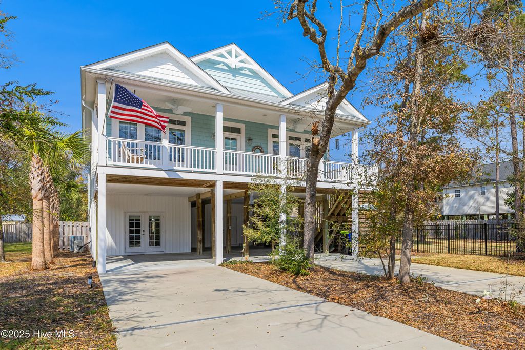 Photo of 117 NW 2nd Street, Oak Island, NC 28465 (MLS # 100499483)