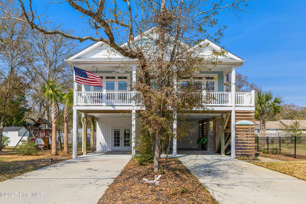 Photo of 117 NW 2nd Street, Oak Island, NC 28465 (MLS # 100499483)