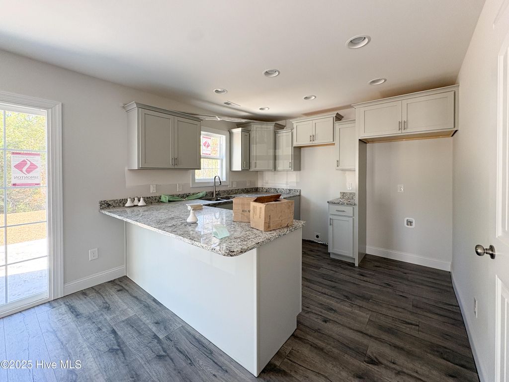 Photo of 720 Ellabond Street, Sneads Ferry, NC 28460 (MLS # 100499954)
