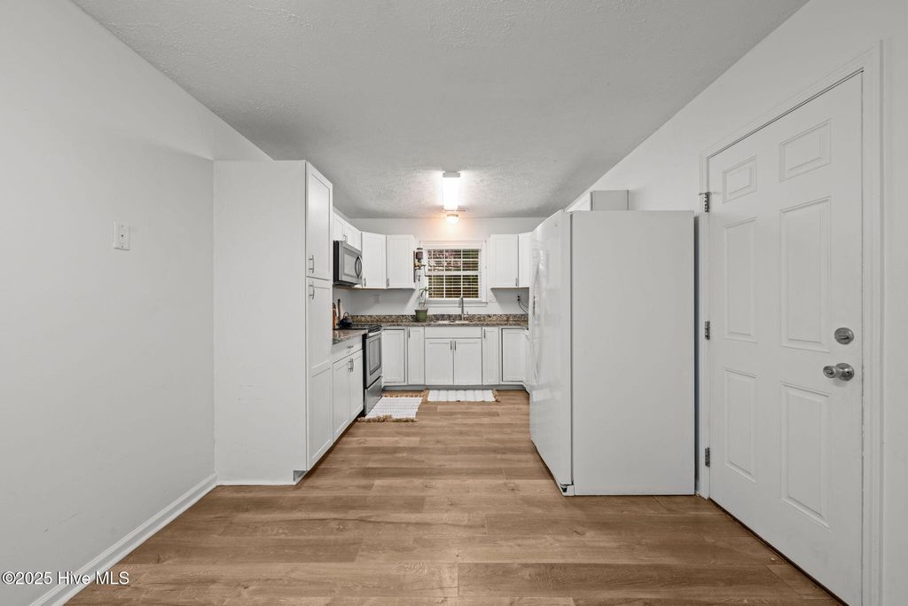 Photo of 217 Attmore Drive, New Bern, NC 28560 (MLS # 100538600)