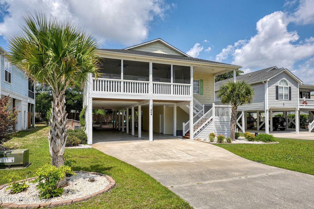 Photo of 409 Womble Street, Oak Island, NC 28465 (MLS # 100541336)