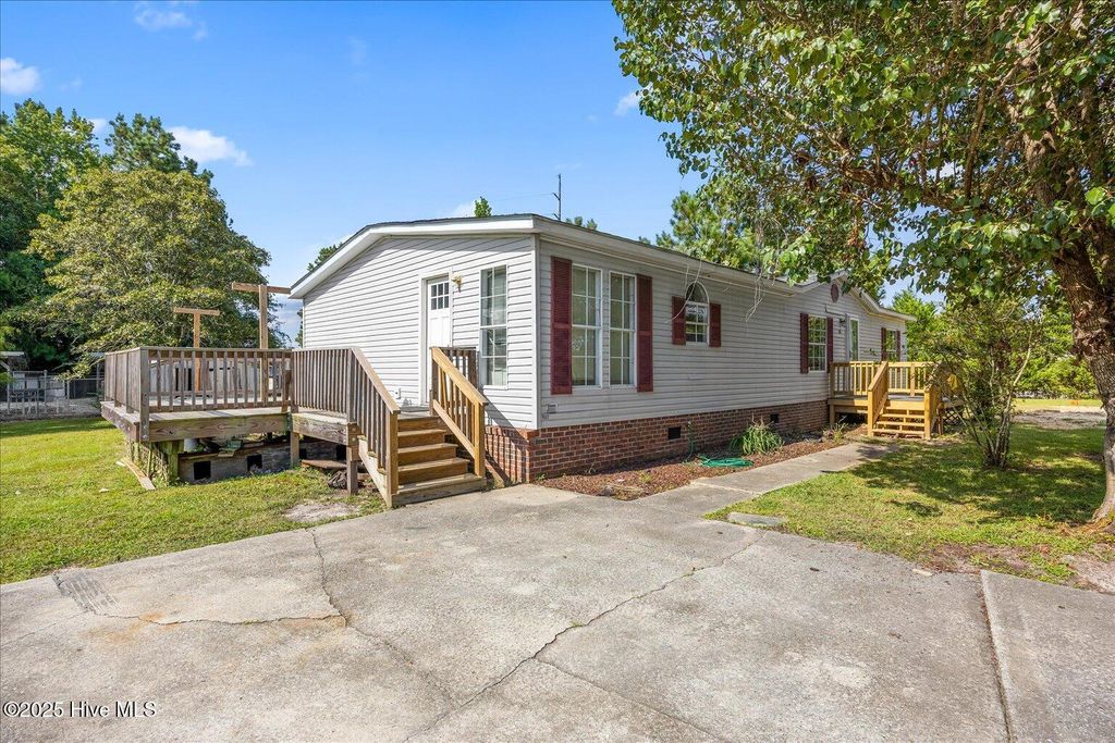 Photo of 65 Hewett Burton Road SE, Leland, NC 28451 (MLS # 100529393)