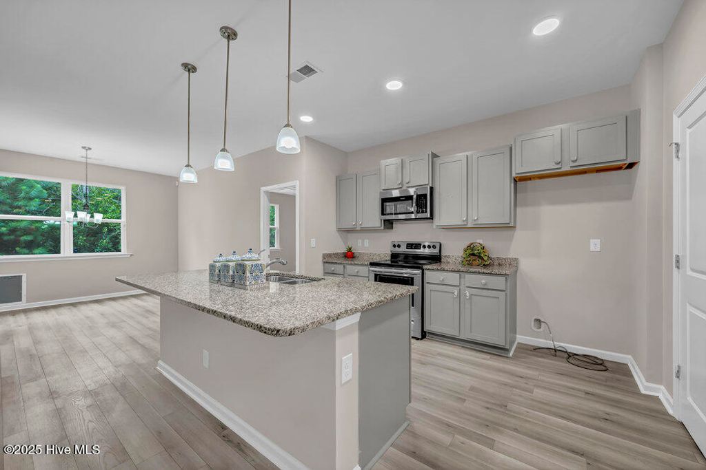 Photo of 1608 Godney Court SE, Bolivia, NC 28422 (MLS # 100520096)