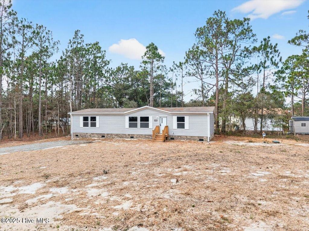 Photo of 3080 Cross Street SW, Shallotte, NC 28470 (MLS # 100544292)