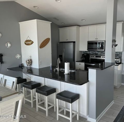 Tiny photo for 618 N Shore Drive, Surf City, NC 28445 (MLS # 100534627)