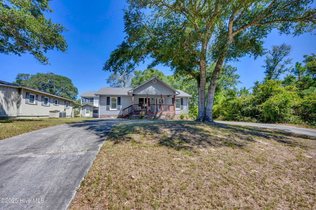 Photo of 1004 E Oak Island Drive, Oak Island, NC 28465 (MLS # 100528052)