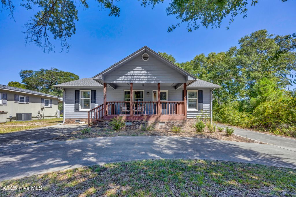 Photo of 1004 E Oak Island Drive, Oak Island, NC 28465 (MLS # 100528052)