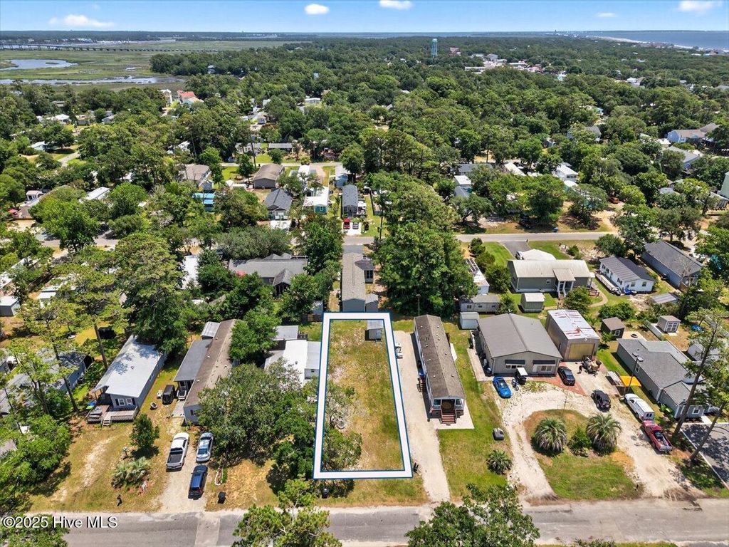 Photo of 130 NE 75th Street, Oak Island, NC 28465 (MLS # 100517582)