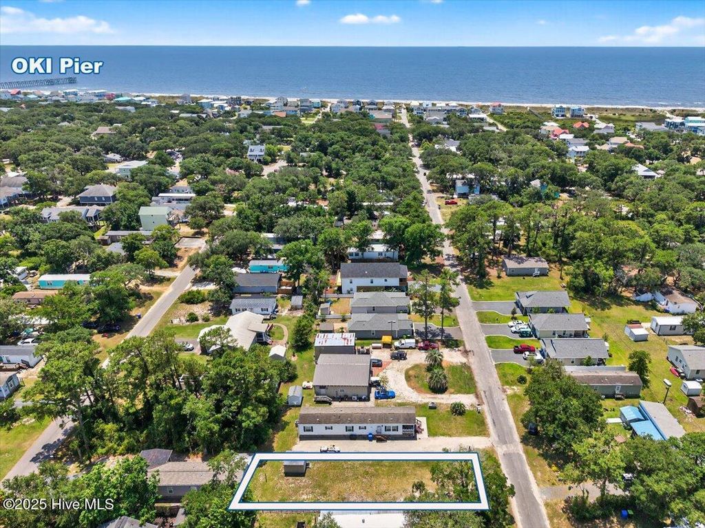 Photo of 130 NE 75th Street, Oak Island, NC 28465 (MLS # 100517582)