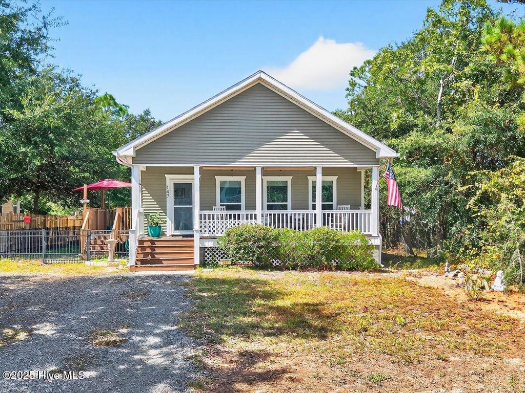 Photo of 147 NE 8th Street, Oak Island, NC 28465 (MLS # 100534389)