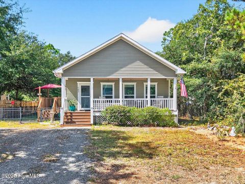 Photo of 147 NE 8th Street, Oak Island, NC 28465 (MLS # 100534389)