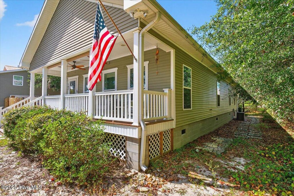 Photo of 147 NE 8th Street, Oak Island, NC 28465 (MLS # 100534389)