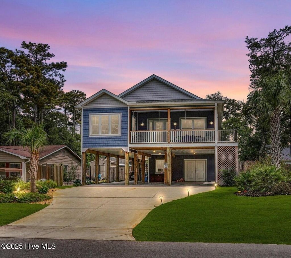 Photo of 314 NE 61st Street, Oak Island, NC 28465 (MLS # 100531010)
