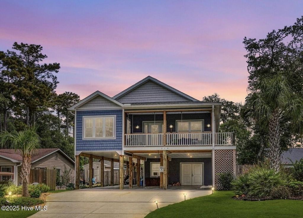 Photo of 314 NE 61st Street, Oak Island, NC 28465 (MLS # 100531010)