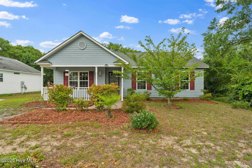 Photo of 161 NE 7th Street, Oak Island, NC 28465 (MLS # 100520698)