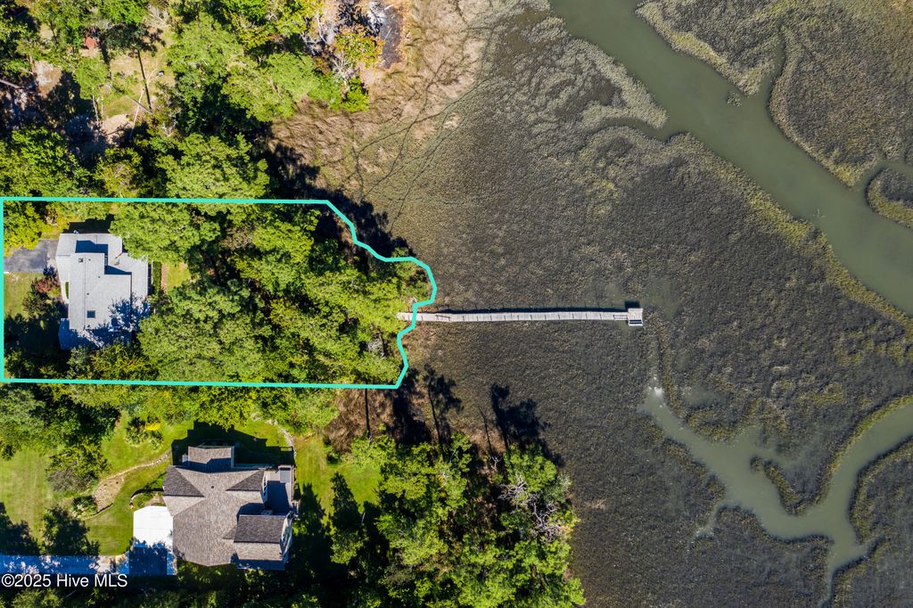 Photo of 605 Sawgrass Road, Hampstead, NC 28443 (MLS # 100529512)