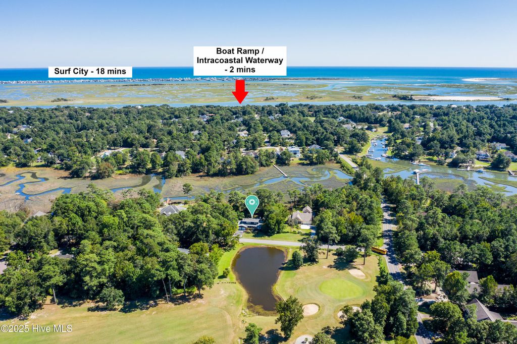 Photo of 605 Sawgrass Road, Hampstead, NC 28443 (MLS # 100529512)
