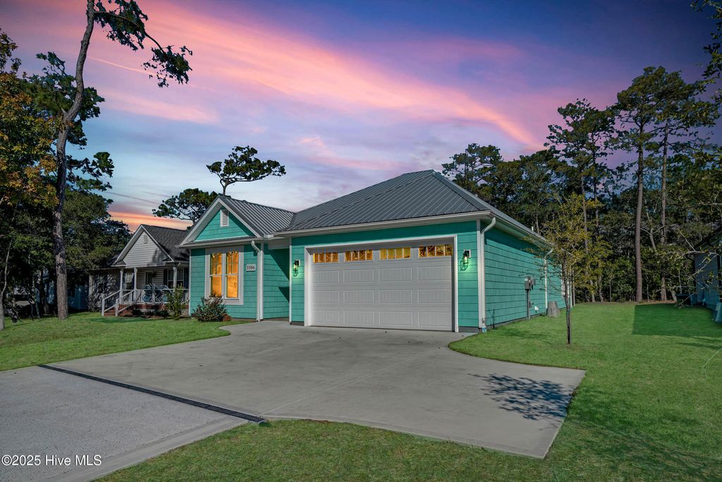 Photo of 3506 E Oak Island Drive, Oak Island, NC 28465 (MLS # 100460470)