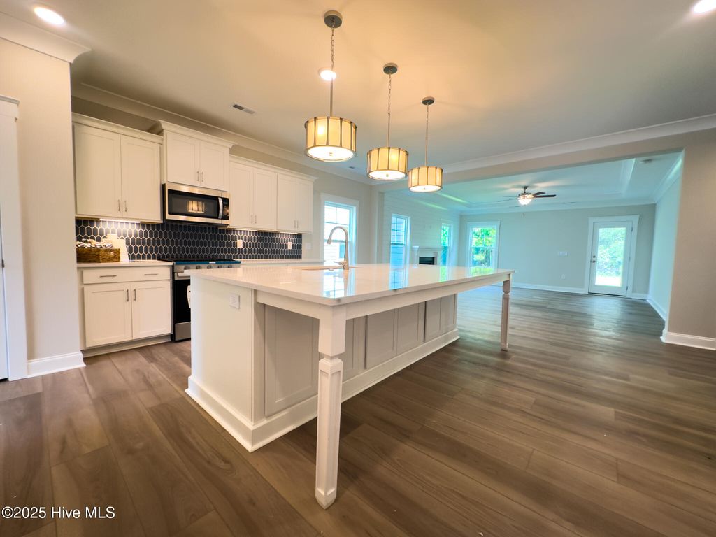Photo of 107 Spicer Lake Drive, Holly Ridge, NC 28445 (MLS # 100501651)