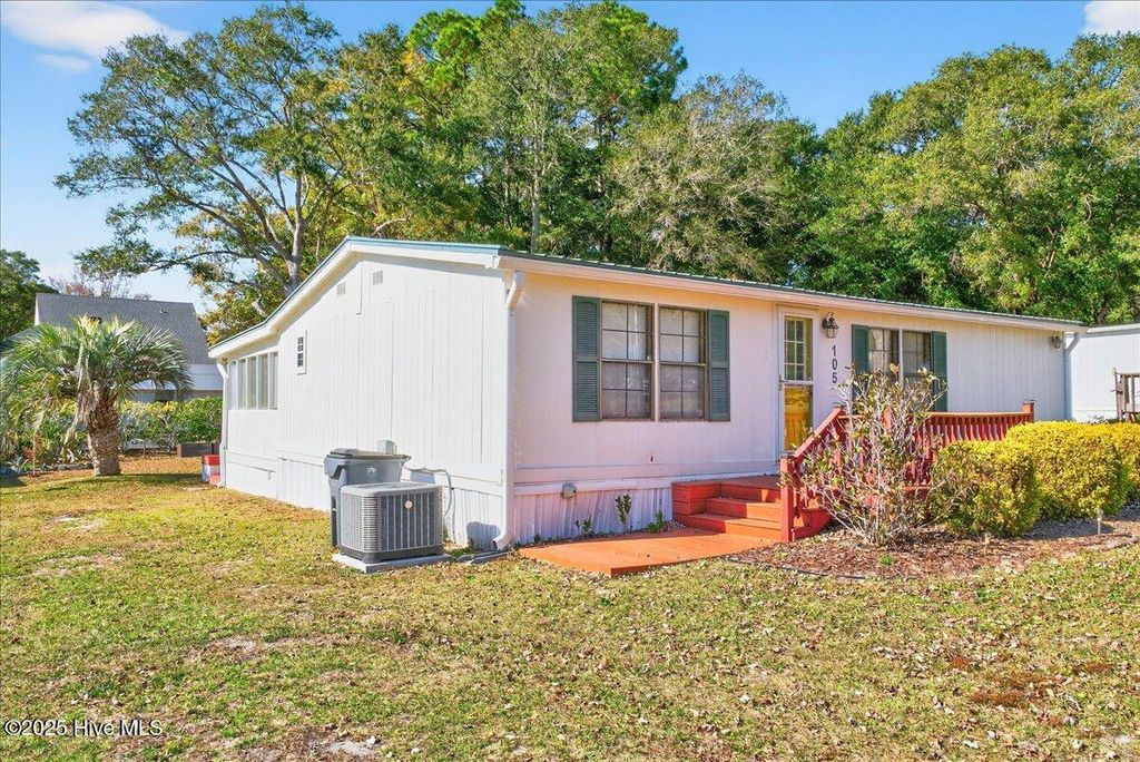 Photo of 105 Live Oak Drive, Sunset Beach, NC 28468 (MLS # 100542395)