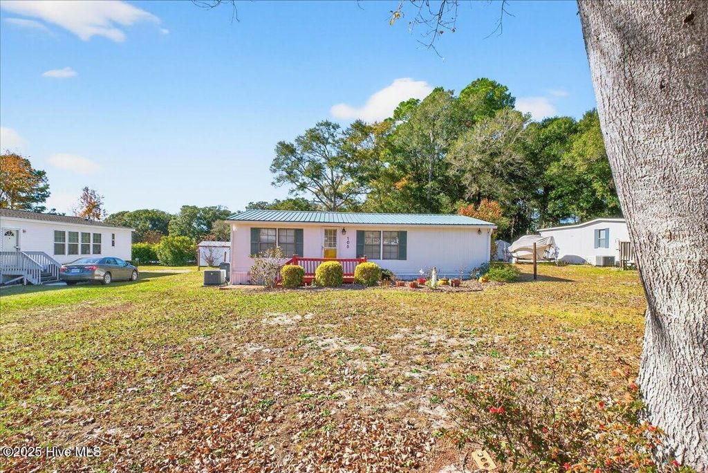 Photo of 105 Live Oak Drive, Sunset Beach, NC 28468 (MLS # 100542395)