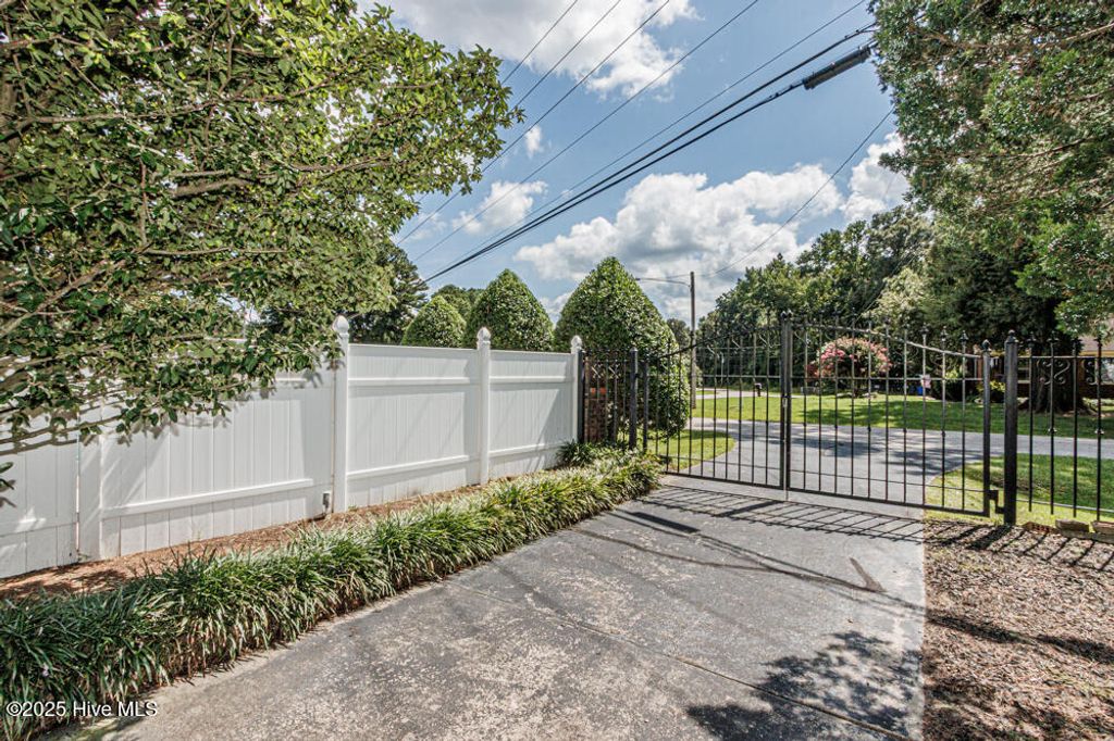 Photo of 1132 Par Three Drive S, Wilson, NC 27893 (MLS # 100525686)