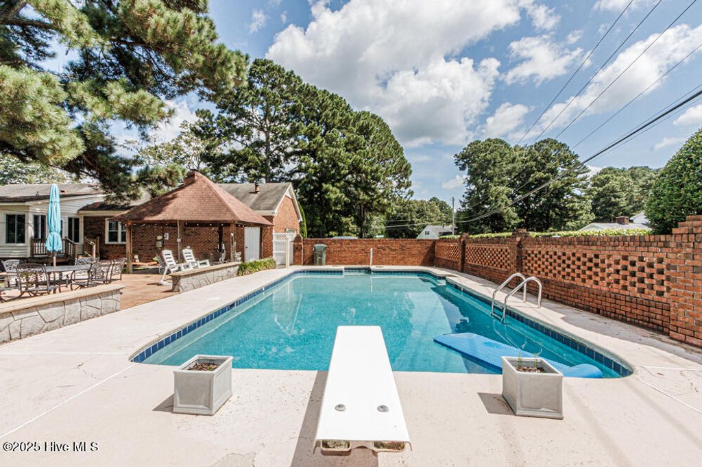 Photo of 1132 Par Three Drive S, Wilson, NC 27893 (MLS # 100525686)