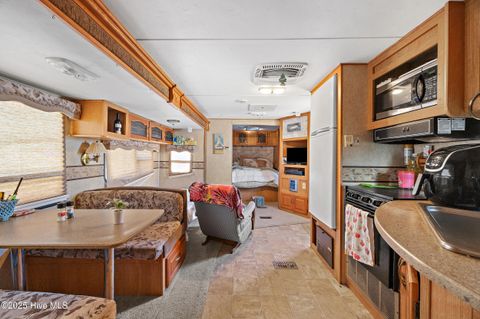 Tiny photo for 8889 Pelican Street, North Topsail Beach, NC 28460 (MLS # 100539774)