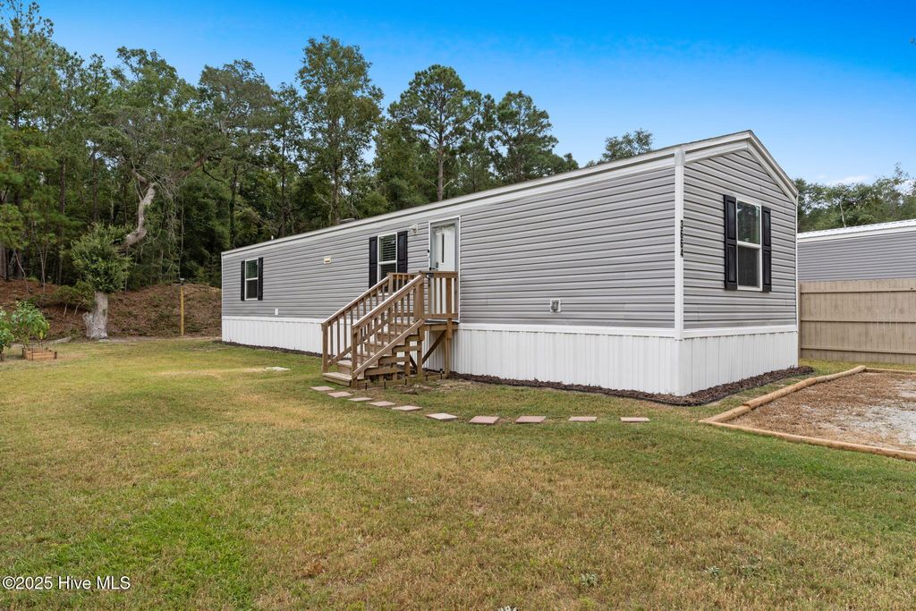 Photo of 3664 Lakeview Drive SW, Supply, NC 28462 (MLS # 100530458)