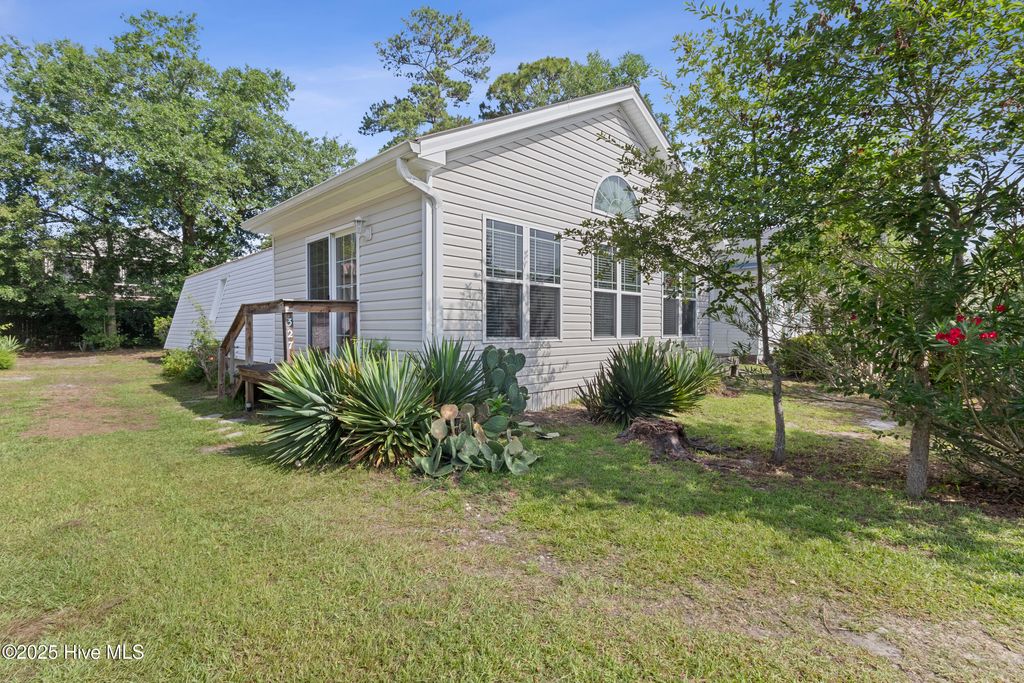Photo of 327 NE 54th Street, Oak Island, NC 28465 (MLS # 100515071)