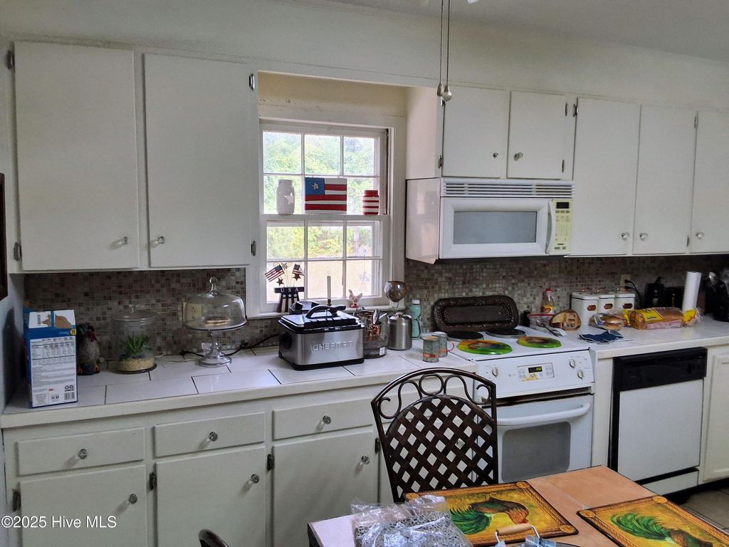Photo of 104 Woodrow Street, Tabor City, NC 28463 (MLS # 100535903)