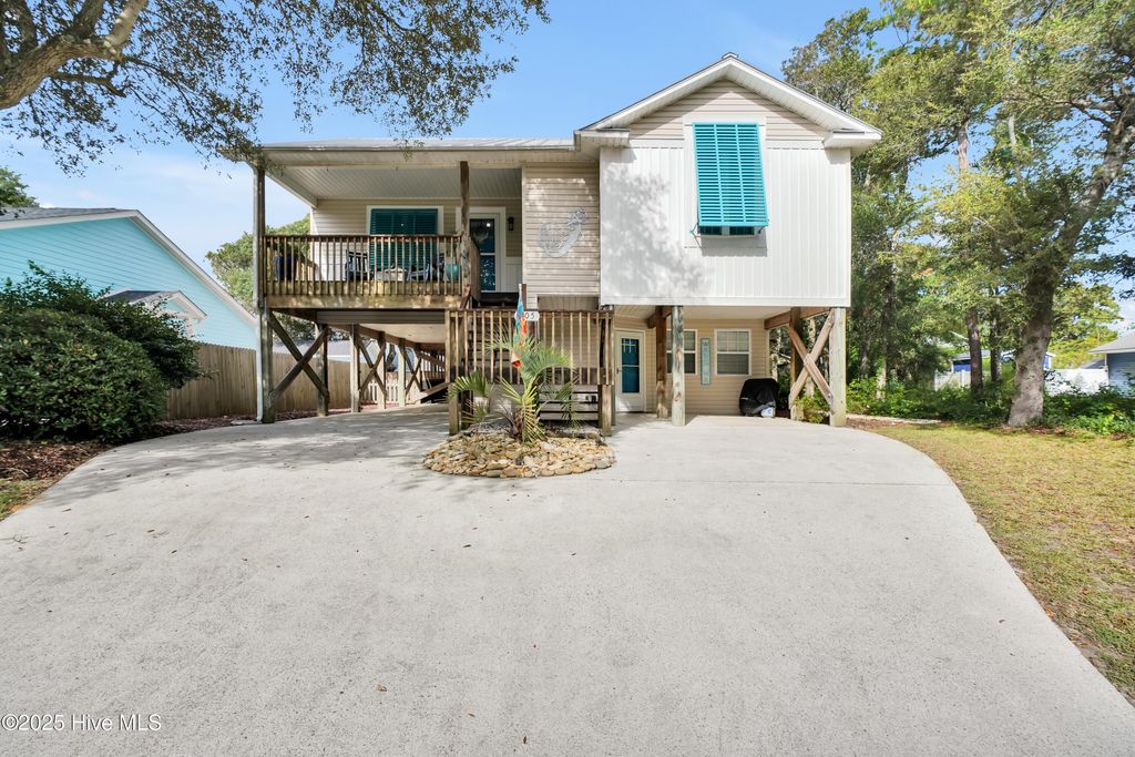 Photo of 105 SE 37th Street, Oak Island, NC 28465 (MLS # 100532413)