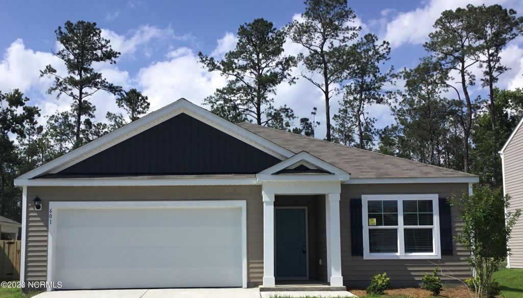 Photo of 601 Draymore Drive NE, Leland, NC 28451 (MLS # 100542934)