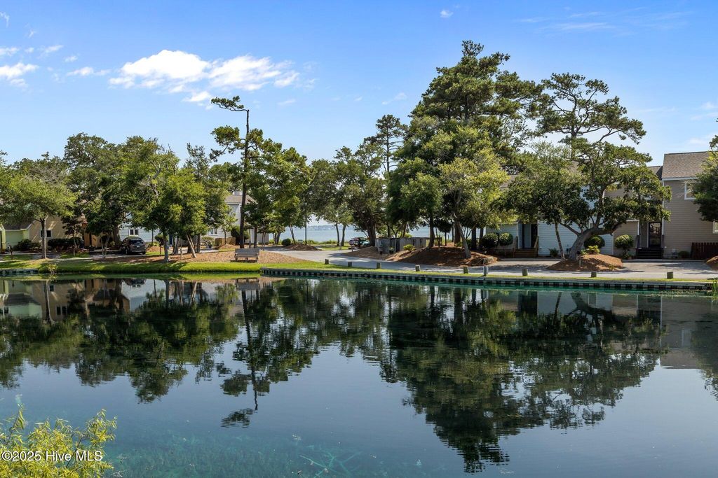 Photo of 300 Mcginnis Drive, Pine Knoll Shores, NC 28512 (MLS # 100514421)