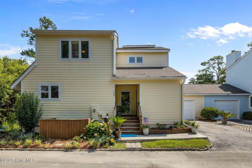 Photo of 300 Mcginnis Drive, Pine Knoll Shores, NC 28512 (MLS # 100514421)