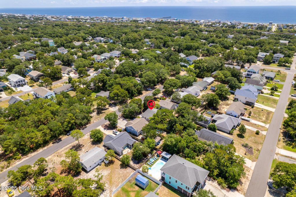 Photo of 115 NE 9th Street, Oak Island, NC 28465 (MLS # 100521576)
