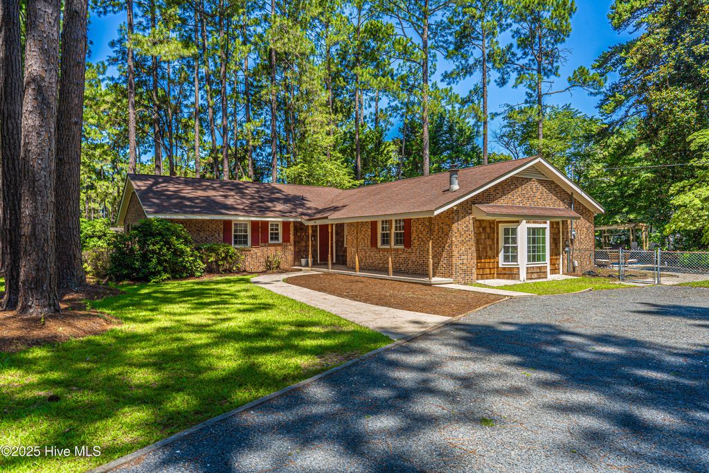 Photo of 606 John Mcqueen Road, Aberdeen, NC 28315 (MLS # 100516313)