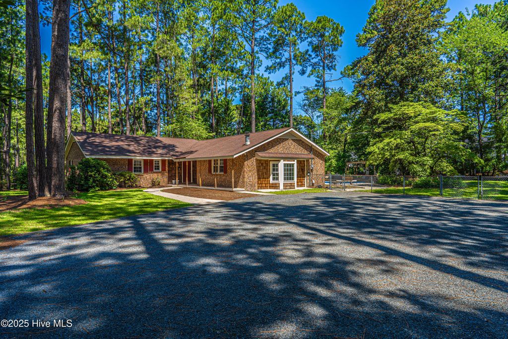 Photo of 606 John Mcqueen Road, Aberdeen, NC 28315 (MLS # 100516313)